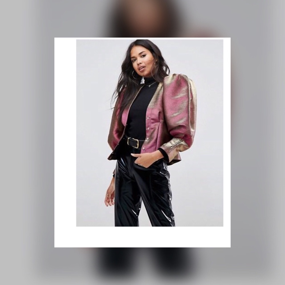 Jacket with shoulder pads. Brand new with tags.